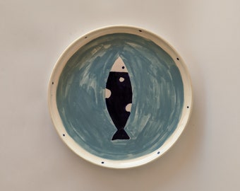Fish imprinted ceramic plate
