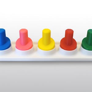 May include: A colorful toy featuring five pegs in blue, pink, yellow, red, and green. Each peg is a different color and sits on a white base. The pegs are cylindrical with a rounded top. The toy is designed for educational play.