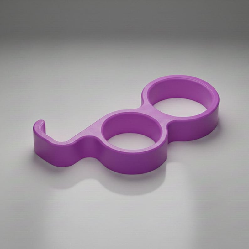 May include: A solid purple, ergonomic door opener tool. The tool has two circular finger holes and a curved hook on one end. The design is made of a single piece of plastic.