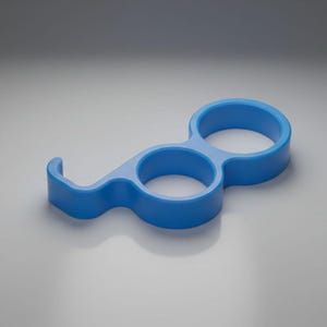 May include: A blue plastic multi-tool with two circular openings and a curved hook. The tool is designed to be held in the hand and used for various tasks. The object is made of a solid, smooth material.