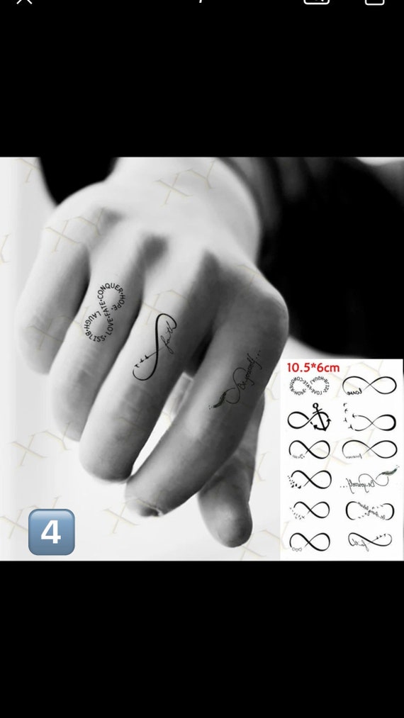 Small finger tattoo by Łukasz Krupiński - Tattoogrid.net