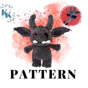 Può includere: Schema di uncinetto per un mostro amigurumi grigio e nero con occhi grandi e un ghigno pieno di denti. Lo schema include istruzioni per realizzare il mostro con le ali.