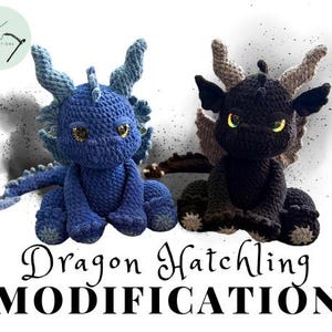 May include: Two crocheted dragon hatchlings, one blue and one black, with embroidered eyes. The blue dragon has a light blue body and a dark blue tail. The black dragon has a dark gray body and a light gray tail. The text "Dragon Hatchling Modification" is written below the dragons.