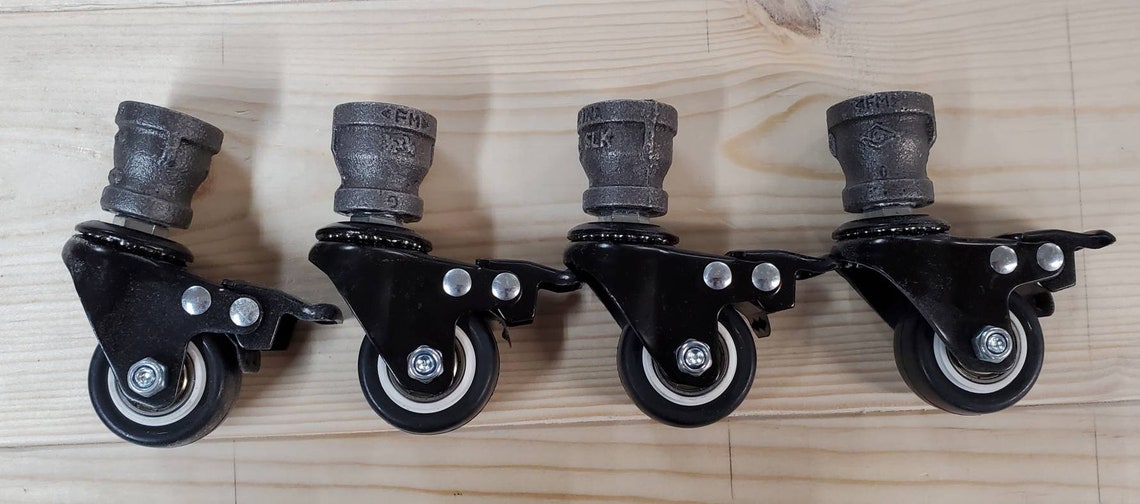 1 1/2 casters for 1/2 black pipe legs. Etsy