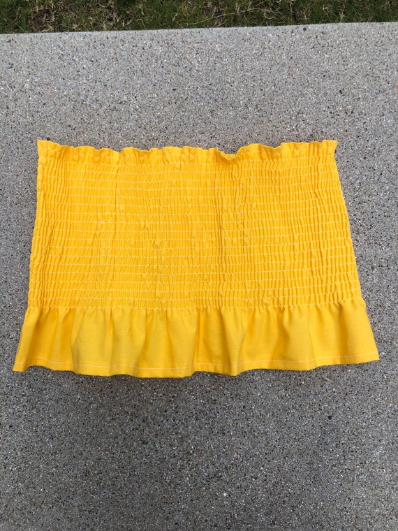 yellow ruffle tube top