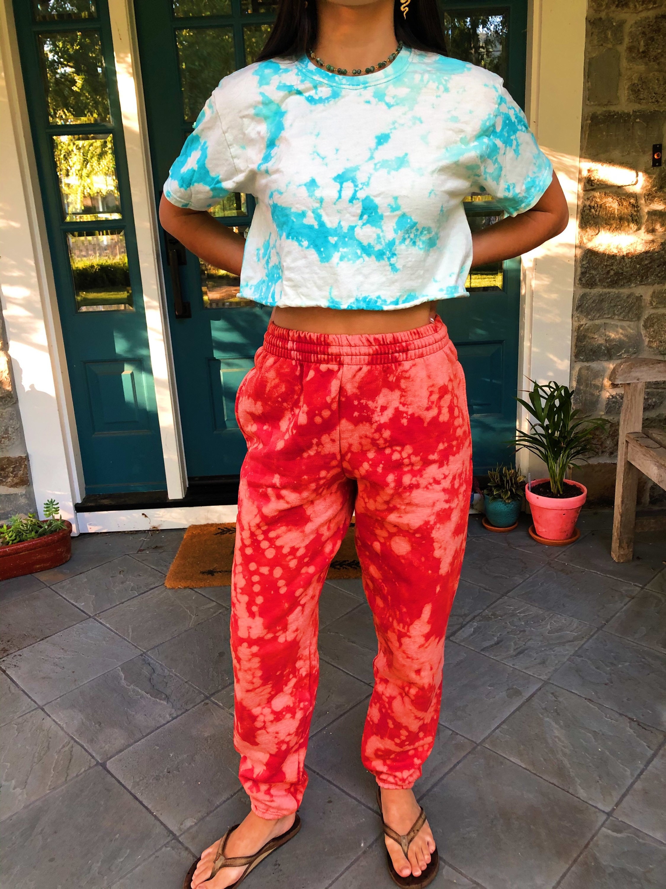 Bleached red sweatpants sale