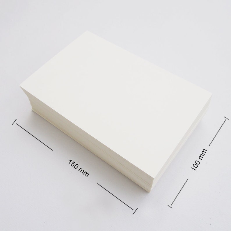 May include: A stack of white paper measuring 150 mm by 100 mm.