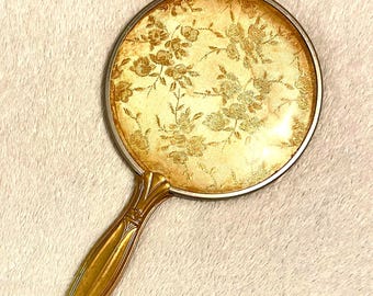 Vintage Vanity Mirror, Round with a Gold Tone Handle and Silvertone Frame, 12”L