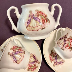 Demitasse Cups and Saucers, Pair and Matching Sugar Bowl