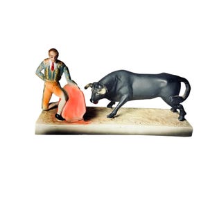 Vintage Mid Century Modern Spanish Bull Fighter Ceramic Matador Statue and Black Bull Figurine Statue