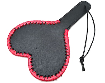 Heart-Shaped Leather Paddle with Fur Lining.