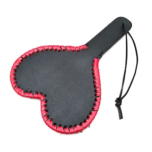 Heart-Shaped Leather Paddle with Fur Lining.