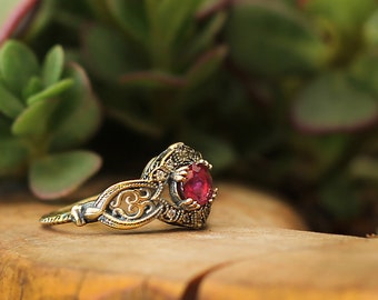 Gold Ring 14K Yellow, with a real Garnet and 12 Diamonds . Handmade . Free shipping .