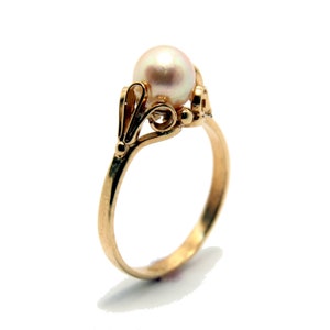 Wonderful Hand made 14k gold pearl ring , antique style and very unique , free shipping express mail . made by myself .