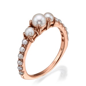Real 14k gold pearl ring , antique style and very unique , free shipping express mail! handmade .