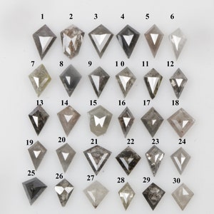 May include: Thirty gray, black, and white rough diamonds in a kite shape, arranged in six rows of five diamonds each. The diamonds are numbered 1 through 30.