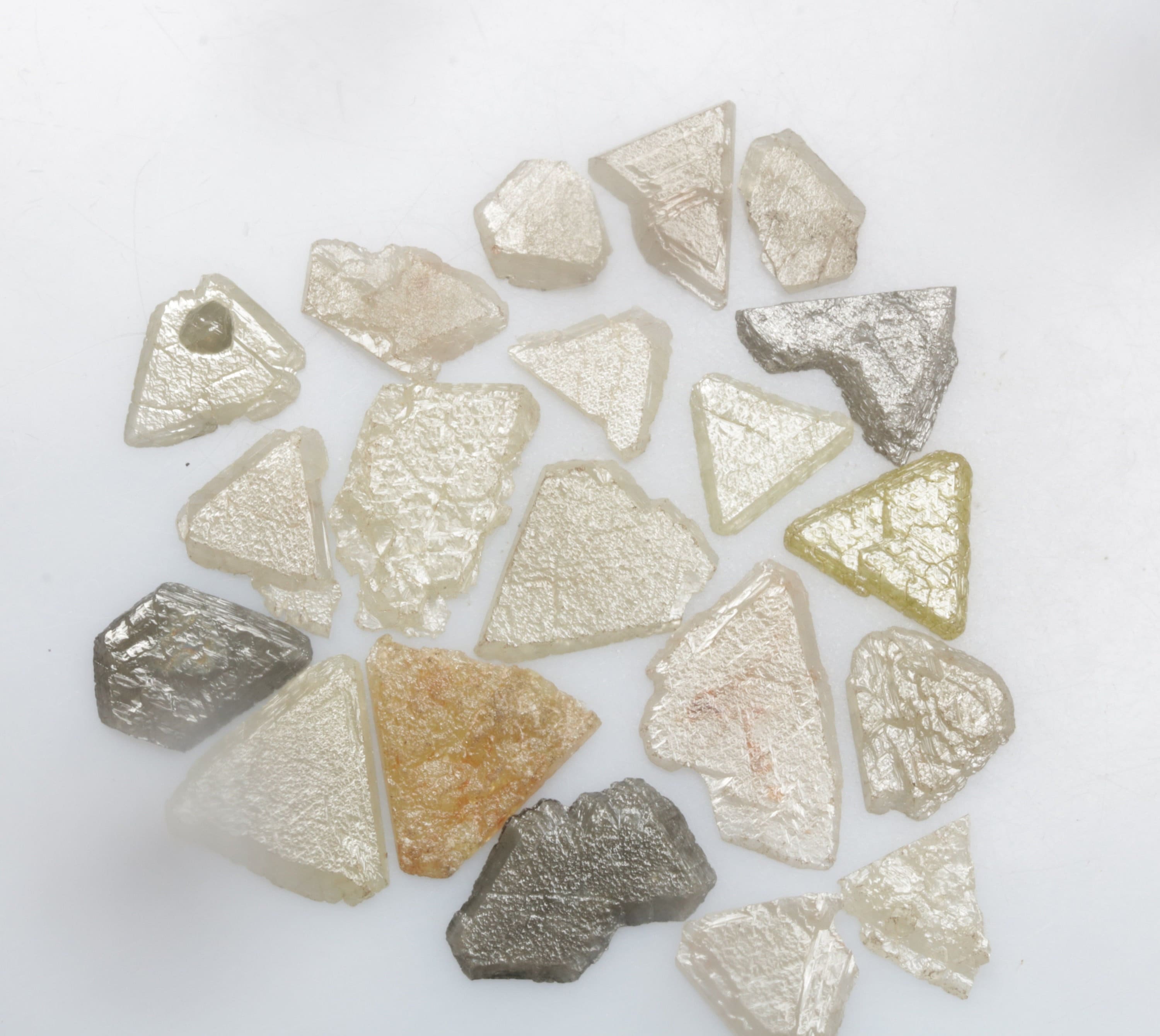 7.0 CT 12.1 X 7.7 MM to 5.4 X 5.8 MM Natural Rough Triangle Cut