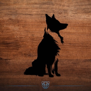 May include: A black silhouette of a dog sitting on a wooden background. The dog is facing right, with its head and tail slightly raised. The wood grain is visible, adding texture to the image. A geometric bear logo is at the bottom.