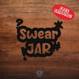 May include: A black wooden sign with the words "Swear JAR" cut out in a playful font. The sign is set against a dark wood grain background. A red oval sticker with the words "FREE SHIPPING!" is in the upper right corner.