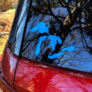Great Lakes Decal in light blue on a car window.