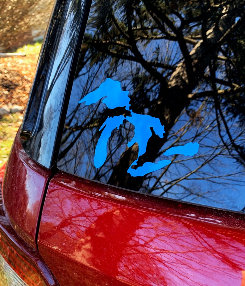 Great Lakes Decal in light blue on a car window.