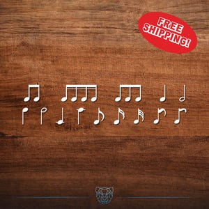 May include: White musical notes are arranged on a dark wood grain background. The notes include whole, half, and quarter notes, along with a few eighth notes. A red oval with the words "FREE SHIPPING!" is in the upper right corner.