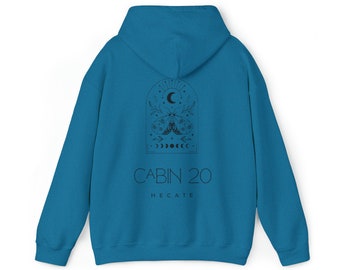 May include: A teal blue hooded sweatshirt with a black graphic design of a moth, crescent moon, and stars inside an arched window. The text "CABIN 20 HECATE" is printed below the graphic.