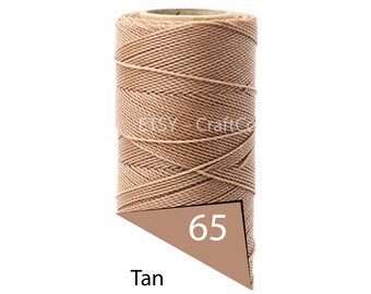May include: A spool of tan-colored waxed cord. The cord is tightly wound around a cardboard core. A tan-colored triangle displays the number 65 and the word "Tan". The Etsy shop name "CraftCo" is visible on the spool.