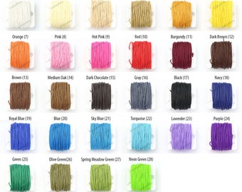 May include: A grid of 28 spools of colorful cord in various shades. Colors include white, cream, beige, light oak, golden yellow, yellow, orange, pink, hot pink, red, burgundy, dark brown, brown, medium oak, dark chocolate, gray, black, navy, royal blue, blue, sky blue, turquoise, lavender, purple, green, olive green, spring meadow green, and neon green.