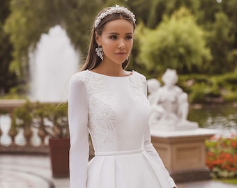 solid white long sleeve wedding dress