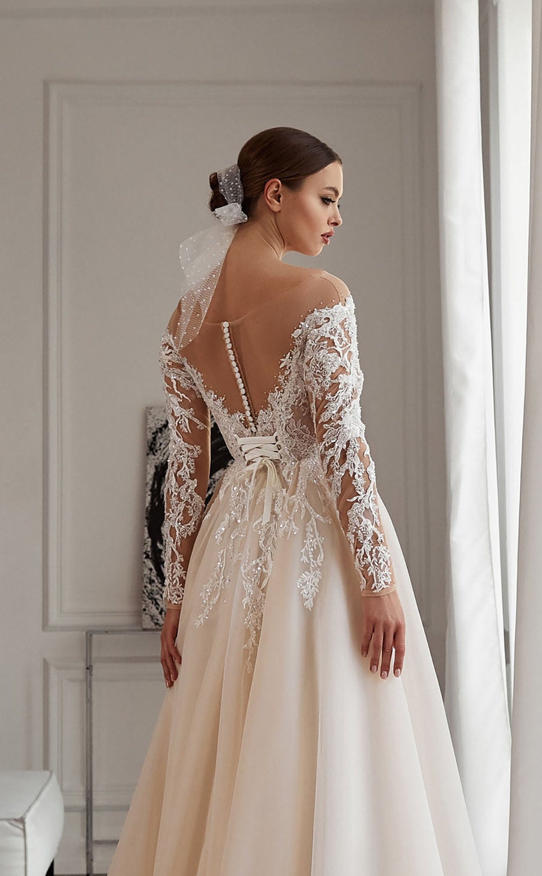 Off the shoulder long sleeve wedding dress with beaded sequins lace