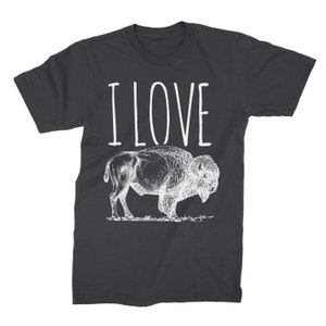 May include: A dark gray t-shirt with the text "I LOVE" printed in white above a white line drawing of a buffalo.