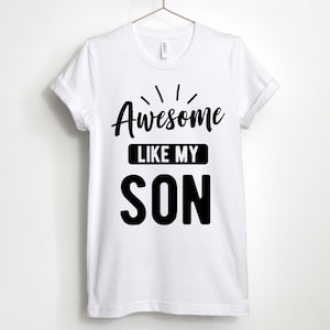 May include: White t-shirt with black text that reads "Awesome Like My Son".