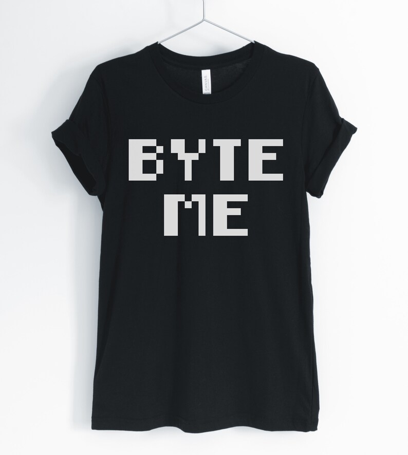May include: Black t-shirt with the text "BYTE ME" in white pixelated letters.
