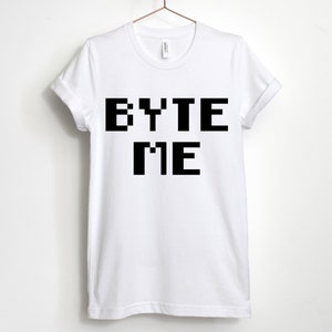 May include: White t-shirt with the text "BYTE ME" in black pixelated letters.