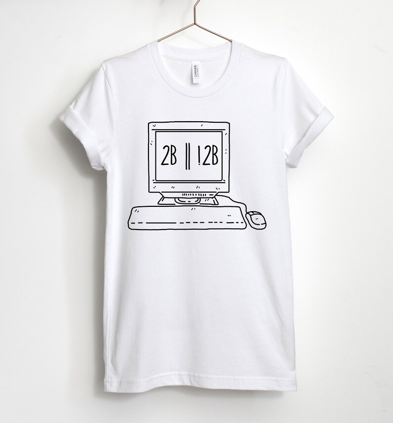 May include: White t-shirt with a black and white illustration of a computer with the text "2B || !2B" on the screen.