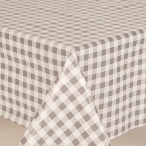 May include: A beige and white checkered tablecloth. The tablecloth is made of a vinyl material and has a glossy finish.