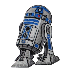 May include: Embroidered patch featuring the iconic R2-D2 droid from Star Wars. The patch showcases a detailed design with shades of blue, white, and gray. The robot's distinctive features are clearly visible, making it a great item for fans.