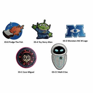 May include: Embroidered patches featuring characters from popular animated films. Includes Pudge the Fish, a Toy Story alien, the Monsters Inc. M logo, Coco Miguel, and Wall-E Eve. Each patch has a unique design and color scheme.