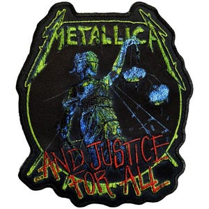 May include: Embroidered patch featuring the band name "Metallica" in green and the phrase "And Justice For All" in red. The patch depicts a figure holding scales, with green and blue accents on a black background.