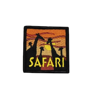 May include: Square embroidered patch featuring a sunset scene with silhouetted giraffes and the word "SAFARI" in yellow. The patch has a black border and is set against a white background.