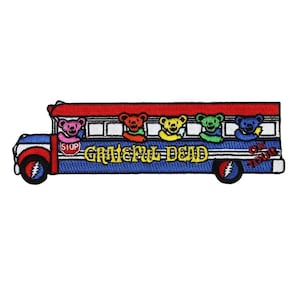 May include: Embroidered patch featuring a blue bus with a red roof and white windows. The bus has the words "Grateful Dead" and "On Tour" in yellow. Five colorful bear characters are visible in the windows.