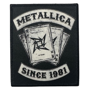 May include: Black square patch featuring the band name "METALLICA" in white arched text above three playing cards. The cards have a distressed design with the band's logo. The text "SINCE 1981" is in white arched text below.