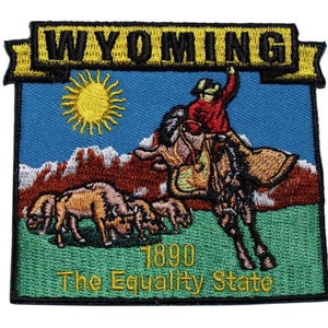 May include: Embroidered patch featuring the state of Wyoming. The patch displays a cowboy riding a bucking bronco, a sun, and bison. The text "WYOMING" is at the top, and "1890 The Equality State" is at the bottom.