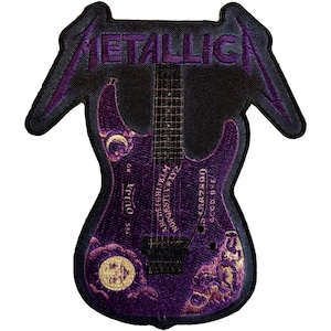 May include: Embroidered patch featuring a purple guitar with a Ouija board design. The word "METALLICA" is embroidered in purple above the guitar. The patch has a black border and a unique shape.