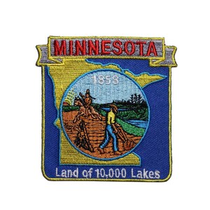 May include: Embroidered patch featuring the state of Minnesota. The patch has a blue border and a gold outline of the state. The center depicts a landscape with a person, trees, and water. The text "MINNESOTA" and "Land of 10,000 Lakes" are included.