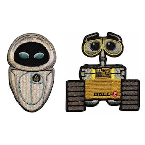May include: Two embroidered patches featuring characters from the animated film Wall-E. One patch depicts the robot Eve, with a white body, black eyes, and a silver head. The other patch shows the robot Wall-E, with a yellow body and black treads.