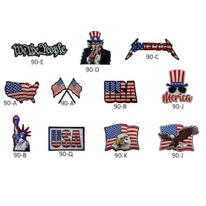 May include: A collection of patriotic patches featuring American flags, Uncle Sam, the Statue of Liberty, and the word "America" in a stylized font. The patches are in red, white, and blue.