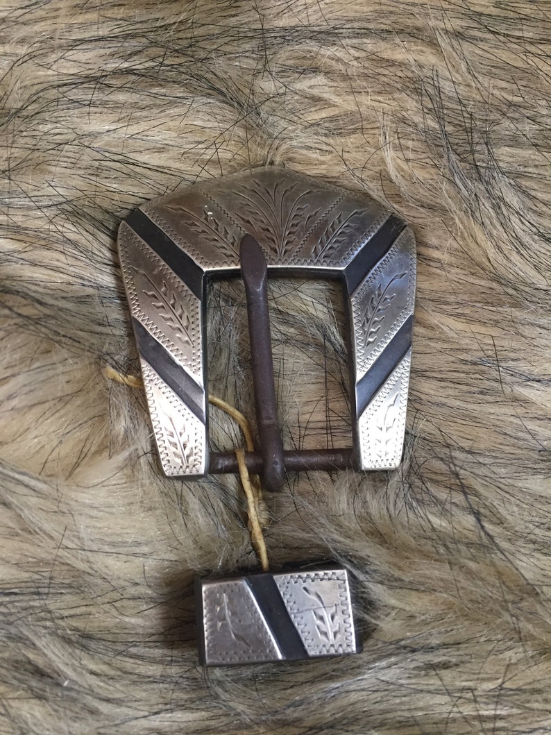 Handmade headstall buckle made by Clint
