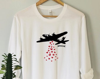 LOVE BOMBING by Banksy Hoodie and Shirt, Anti War Tee, Anti War, Anti War Shirt, Love Shirt,Banksy Shirt,Banksy Tee,Banksy,Art Shirt,Ukraine